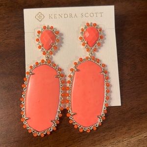 Kendra Scott earrings, excellent condition. Salmon color not orange